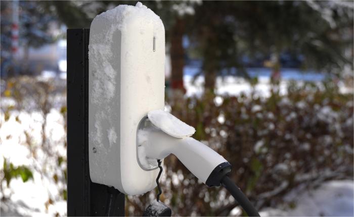 Wissenergy CC30 fleet EV charger covered in snow, demonstrating its durability and weather resistance for fleet charging in extreme cold.